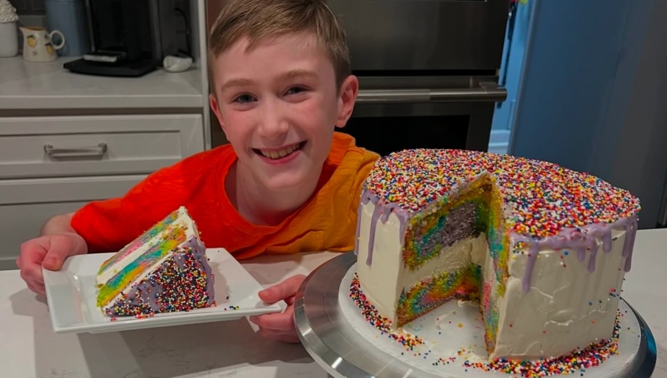 Carter Siporin with a cake.