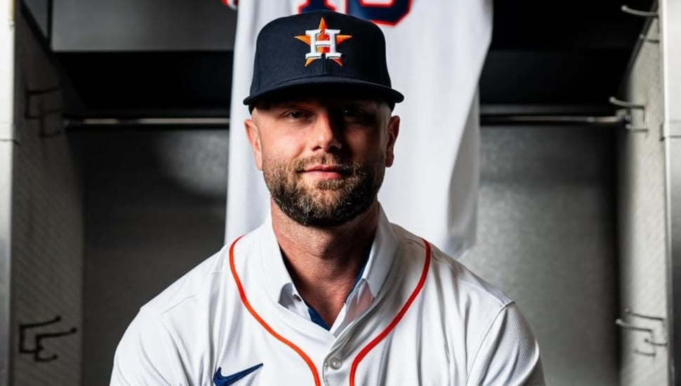 Christian Walker smiles in his new Astros jersey.