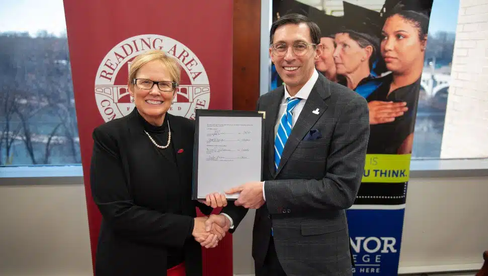 Manor College President Dr. Jonathan Peri (R) and Reading Area Community College President Dr. Susan Looney (L).
