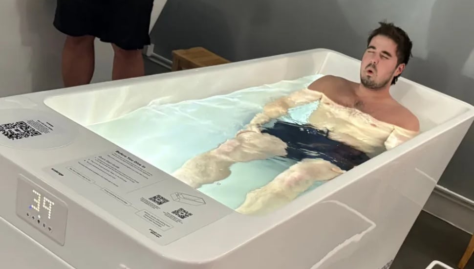 Man in cold plunge tub.