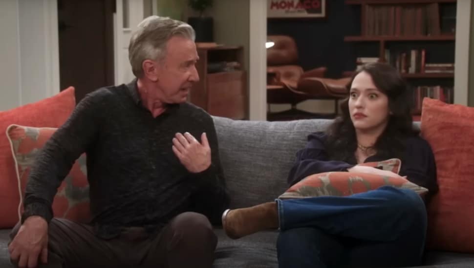Kat Dennings sitting next to Tim Allen on the set of Shifting Gears.