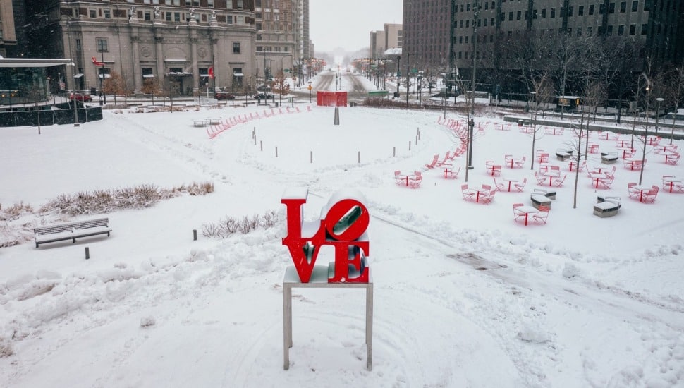 Snow covers Love Park in Philadelphia.