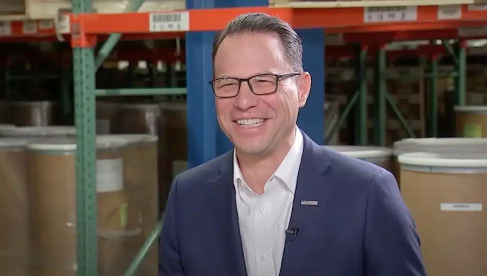Governor Josh Shapiro smiles during an interview.