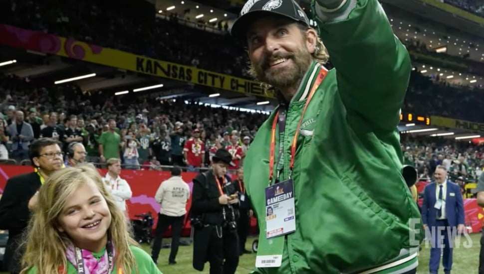 Bradley Cooper on the field with his daughter after the Eagles win the Super Bowl.