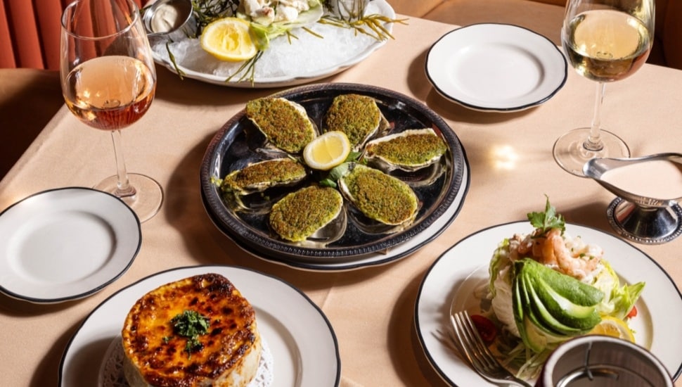 Table of small plate servings at Butcher & Singer.