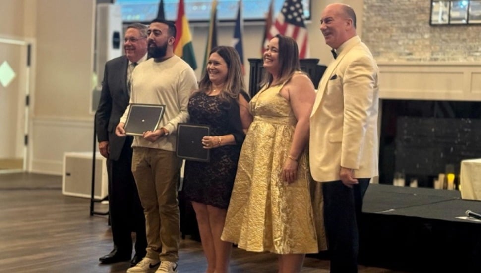 College students receive scholarship awards.