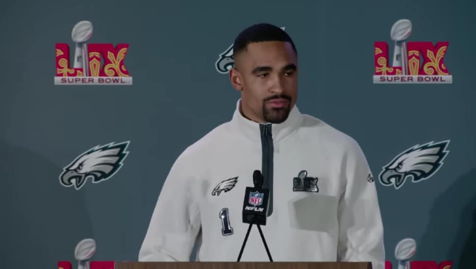 Jalen Hurts speaking at a press conference.