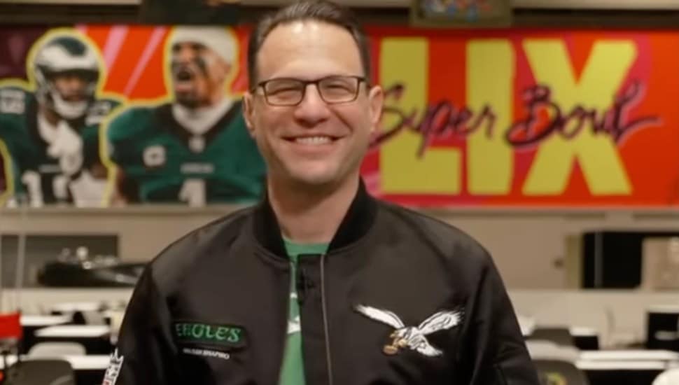 Governor Josh Shapiro wearing an Eagles jacket.