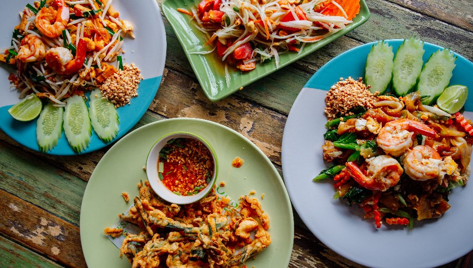 Several Thai food dishes.