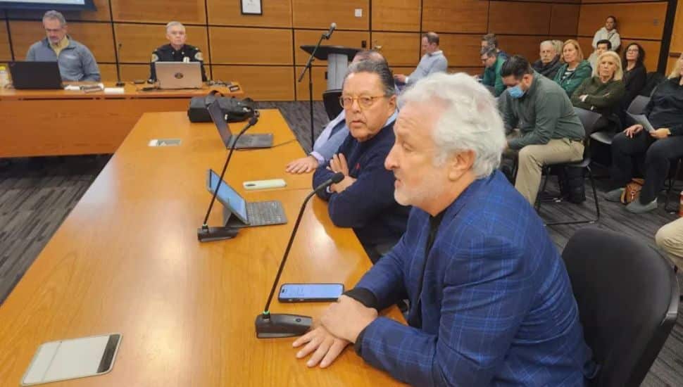 Marc Kaplan sits on supervisor meeting.
