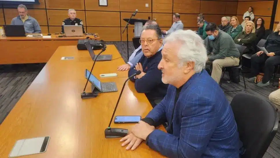Marc Kaplan sits on supervisor meeting.