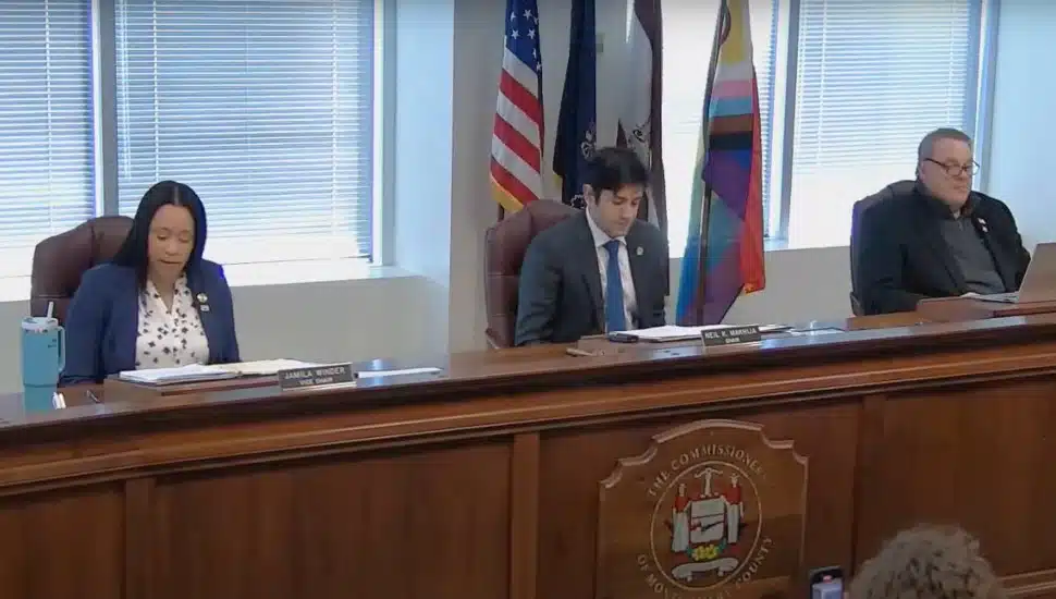 Jamila Winder and Neil Makhija at a Montgomery County Commissioners Board Meeting.