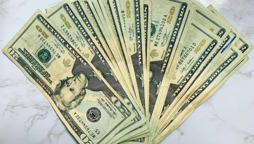 A stack of 20 dollar bills.