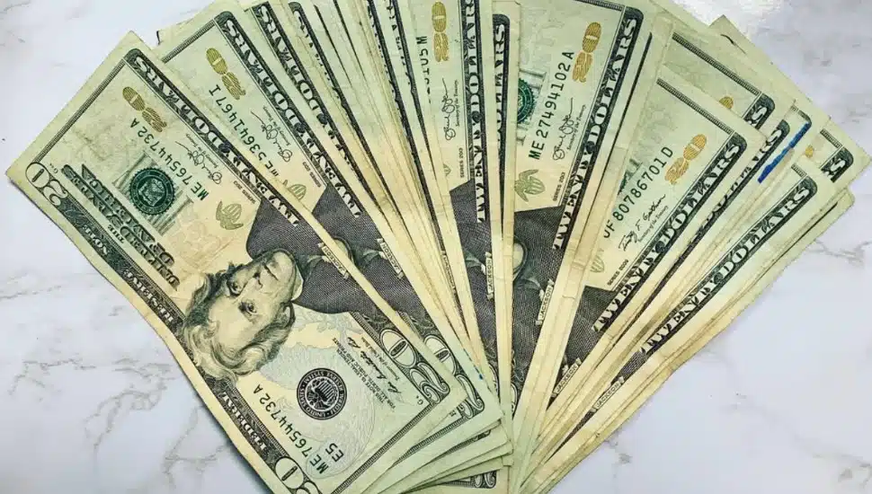 A stack of 20 dollar bills.
