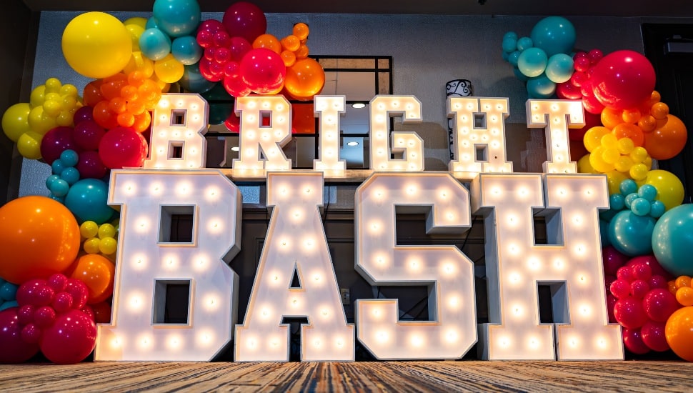 Balloons and lights that spell Bright Bash.