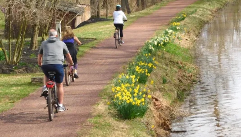 People biking along the Delaware Canal Towpath.