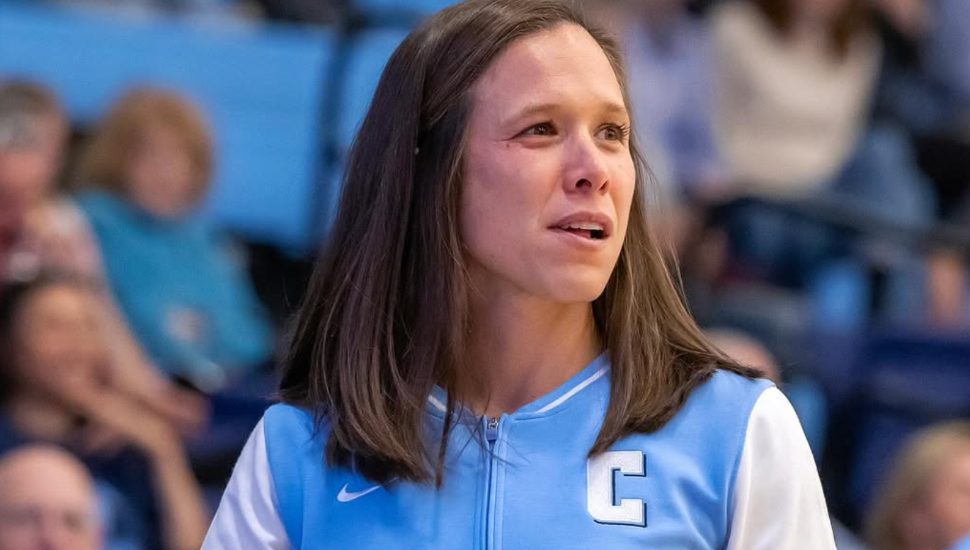 Megan Griffith on the sideline of a Colombia University women's basketball game.