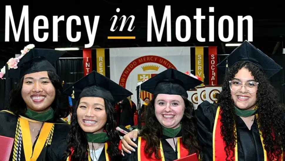 College graduates in cap and gown.