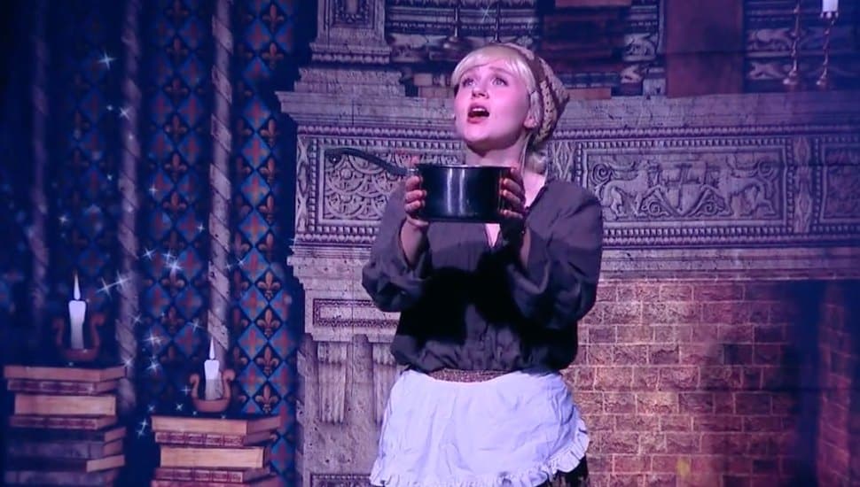 An actress performing on stage for the Narberth Community Theater.