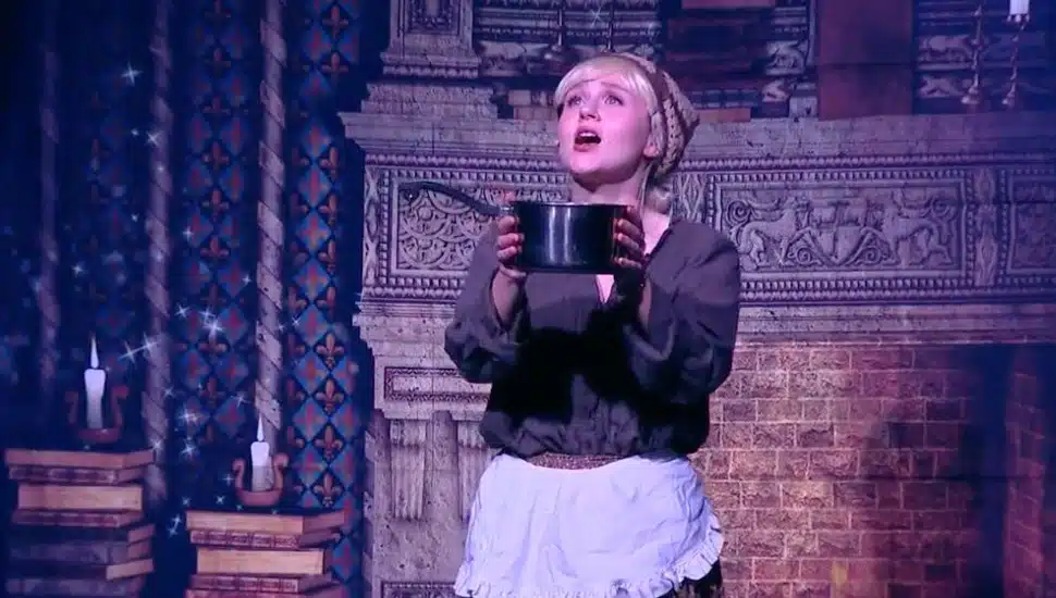 An actress performing on stage for the Narberth Community Theater.