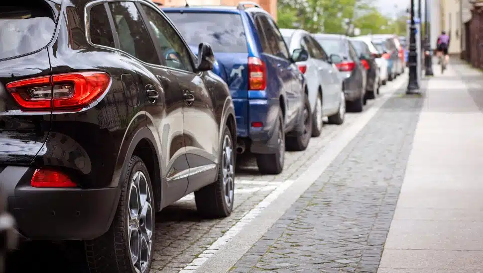 A line of parallel parked cars.