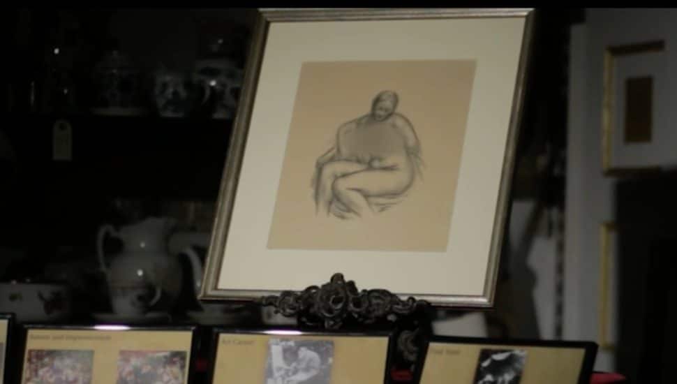 A Renoir painting displayed at Easton's Salvage Goods Antiques.