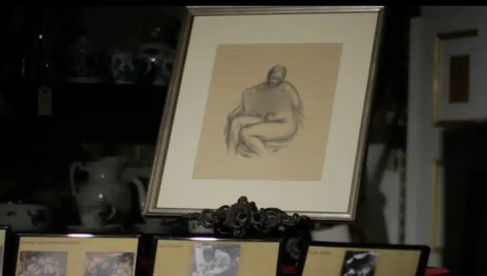 A Renoir painting displayed at Easton's Salvage Goods Antiques.
