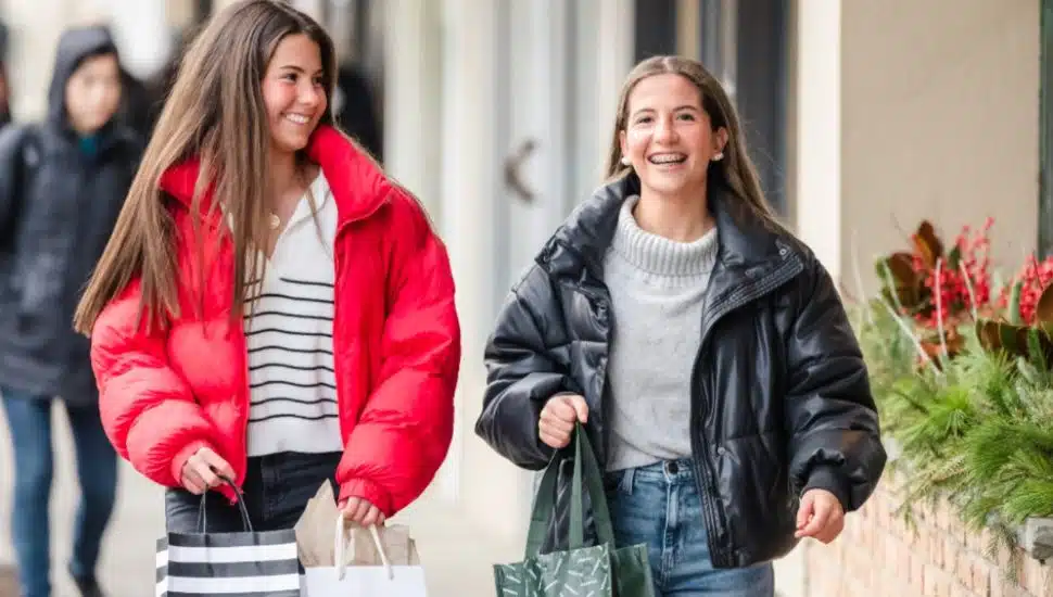 Two young girls shopping at Suburban Square.