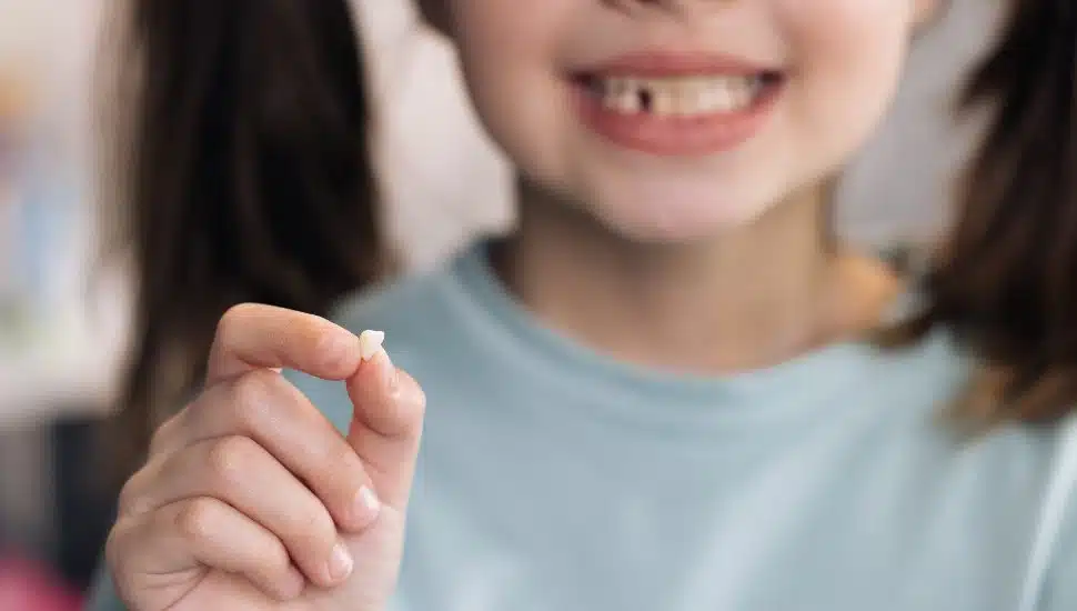 Little Girl Loosing her baby teeth.