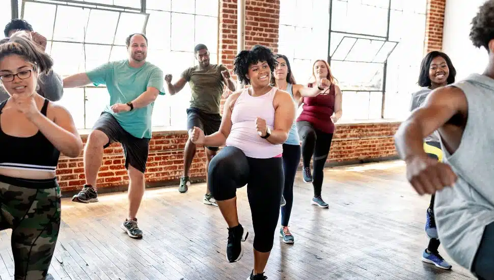 Adults in a group exercise class.