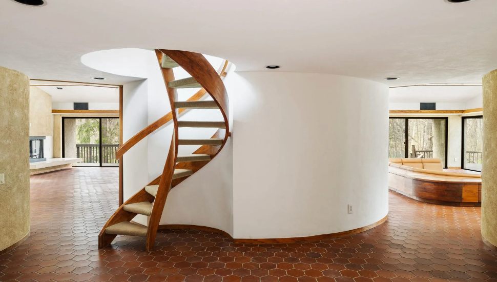 1960s chic spiral staircase at 390 Bryn Mawr Ave residence.