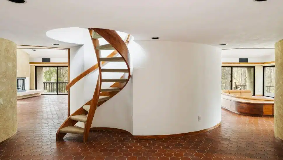 1960s chic spiral staircase at 390 Bryn Mawr Ave residence.