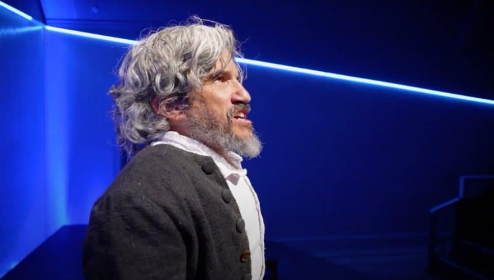 Mark Povinelli on stage as Benjamin Lay.