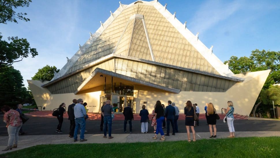 Attendees gather outside the Beth Shalom synagogue.