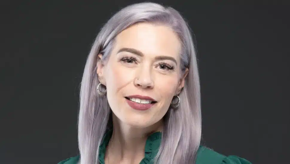 Headshot of middle-aged female paralegal.