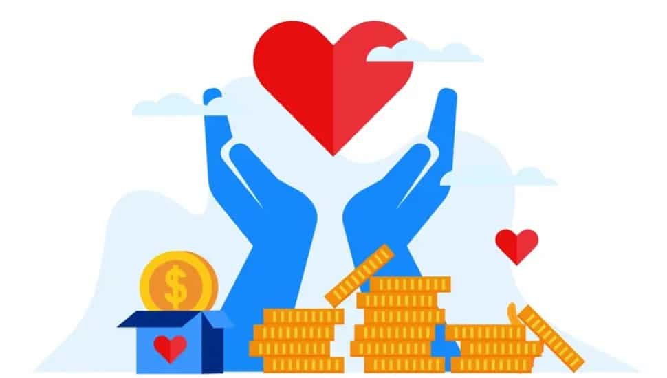 An illustration representing charity or philanthropy. Two large blue hands are raised, cradling a red heart, symbolizing care, support, and compassion. Red hearts floating around emphasize love and kindness. Stacks of gold coins suggest monetary contributions or donations. A blue donation box with a red heart on it and a large gold coin with a dollar sign reinforces the idea of financial giving. The clouds and soft background give a peaceful, uplifting vibe.