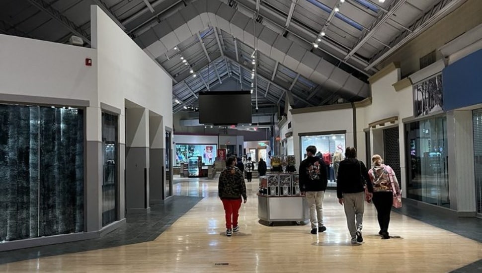 People walking inside Franklin Mall.