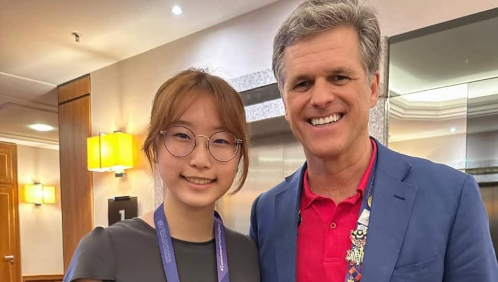 Jianna Kim with Special Olympics chairman Timothy Shriver.