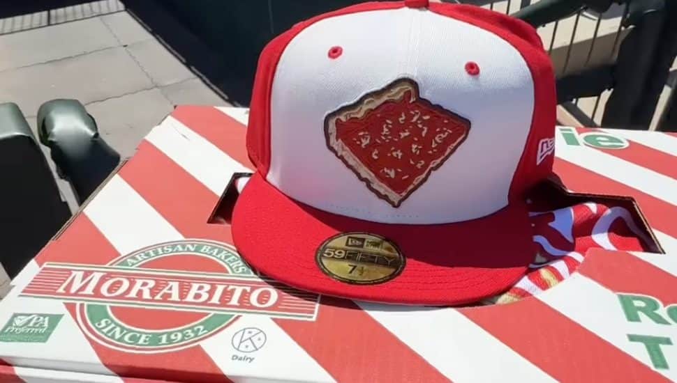 A tomato Pie baseball cap and Morabito's tomato pie.