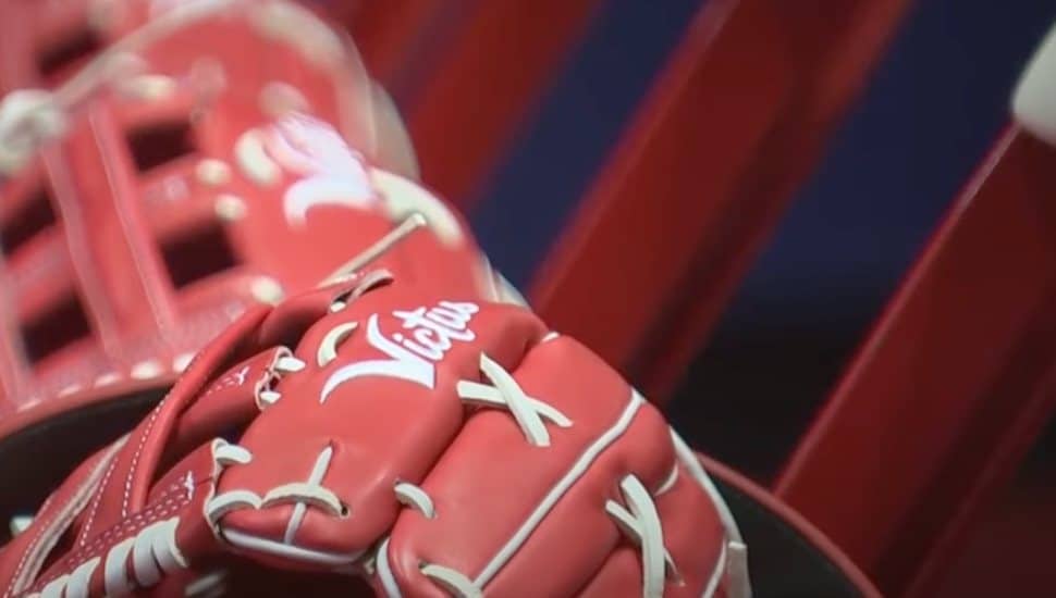 Custom red baseball gloves from Victus Sports.