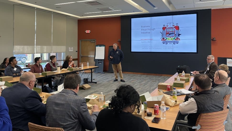 Clemens Family Corporation leaders present to a full boardroom during Montgomery County’s Business Breakthrough roundtable, discussing workforce investment strategies to improve retention and drive growth.