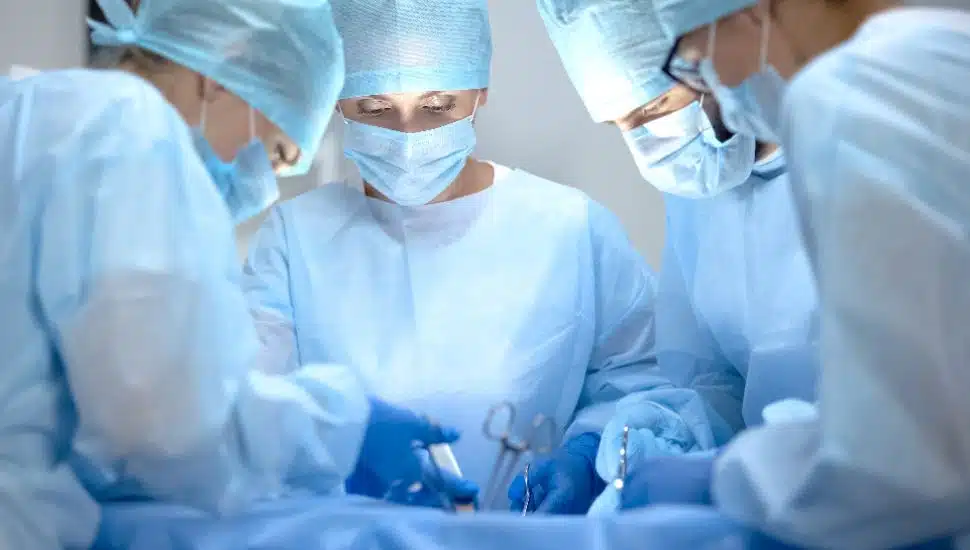 Three surgeons operate on a patient's heart like those that will at the Cardiology Consultants of Philadelphia's new facility in King of Prussia.