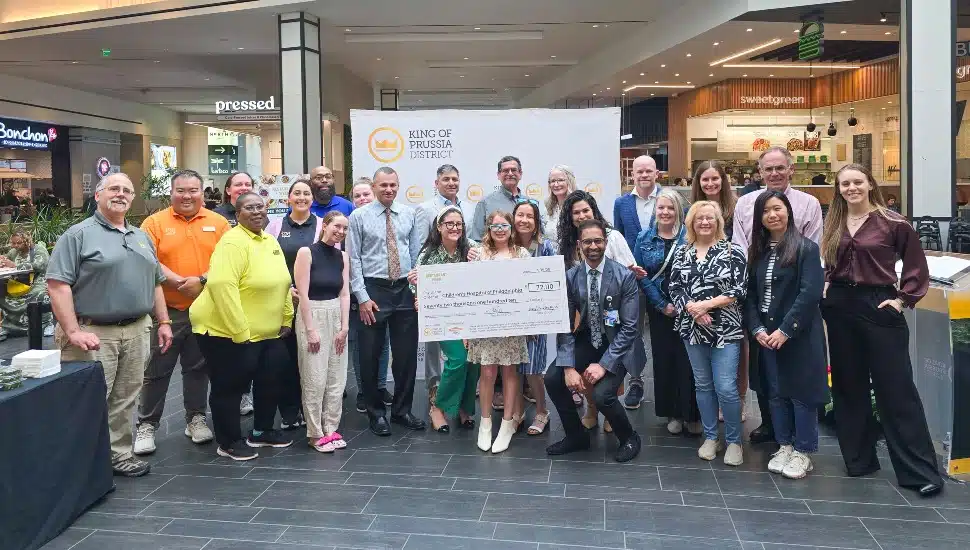 Group photo of a check donation.