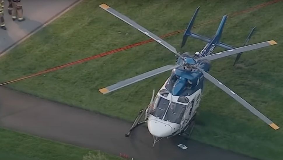 An aerial view of the helicopter landed on the Whitemarsh lawn.