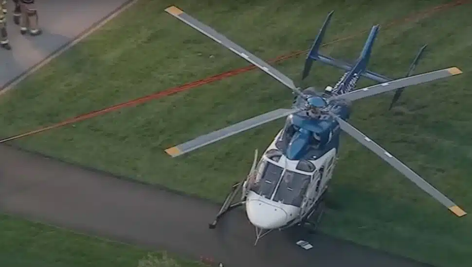 An aerial view of the helicopter landed on the Whitemarsh lawn.