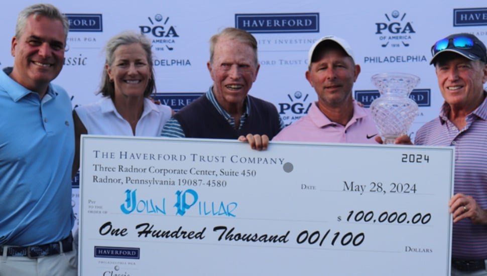 John Pillar accepts prize check from Haverford Trust for winning the 26th Annual Haverford Philadelphia PGA Classic.
