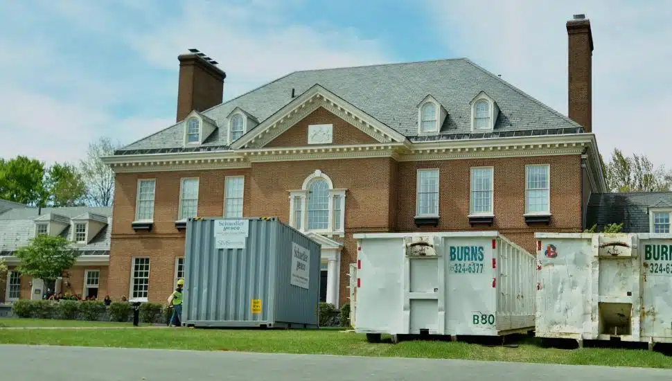 The exterior of Josh Shapiro's home, the governor's mansion with dumpsters in front.