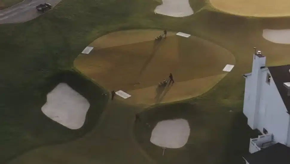 An Aerial view of the greenskeepers mowing the green at the Philadelphia Cricket Club.