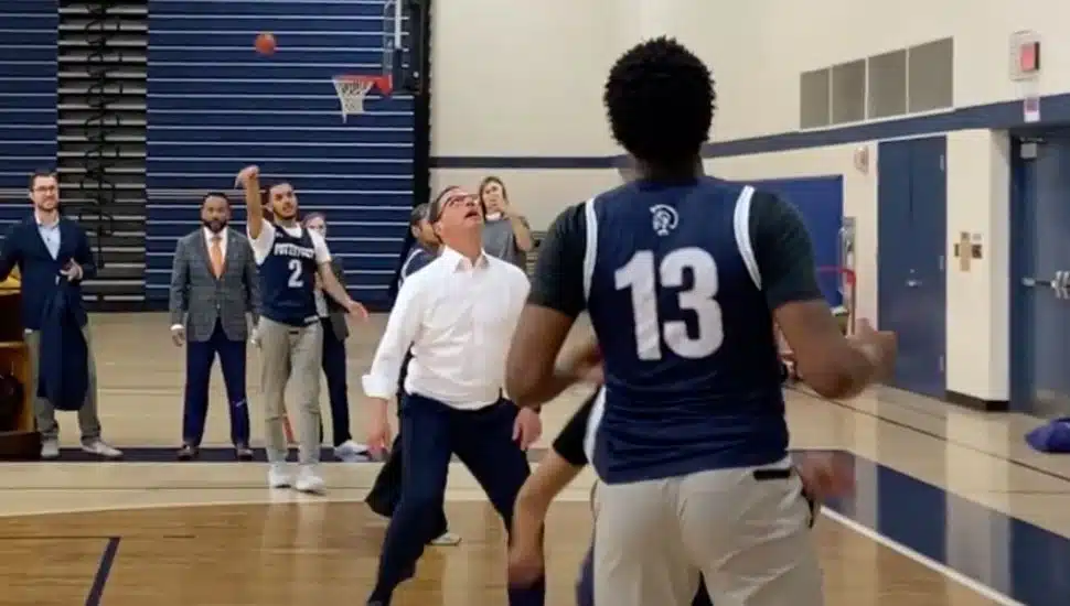 Josh Shapiro posts up under the net for a rebound at Pottstown High School.
