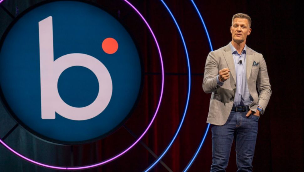 Boomi CEO Steve Lucas stands on stage.